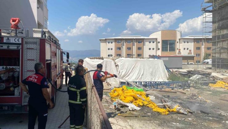 Okul inşaatında yakılan ateş ekipleri harekete geçirdi