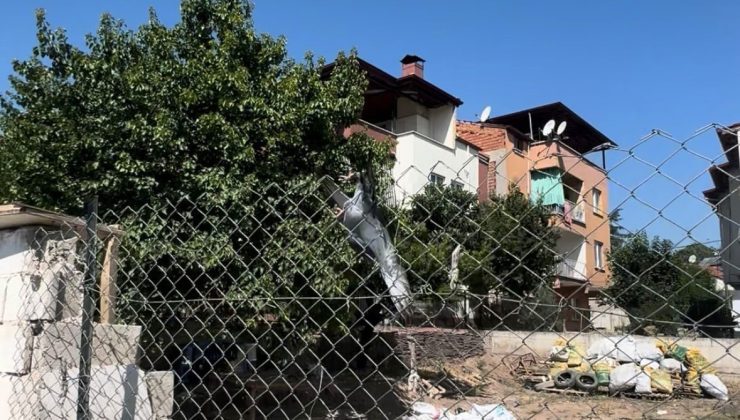 Tellere takılan güvercin imdadına muhtar yetişti